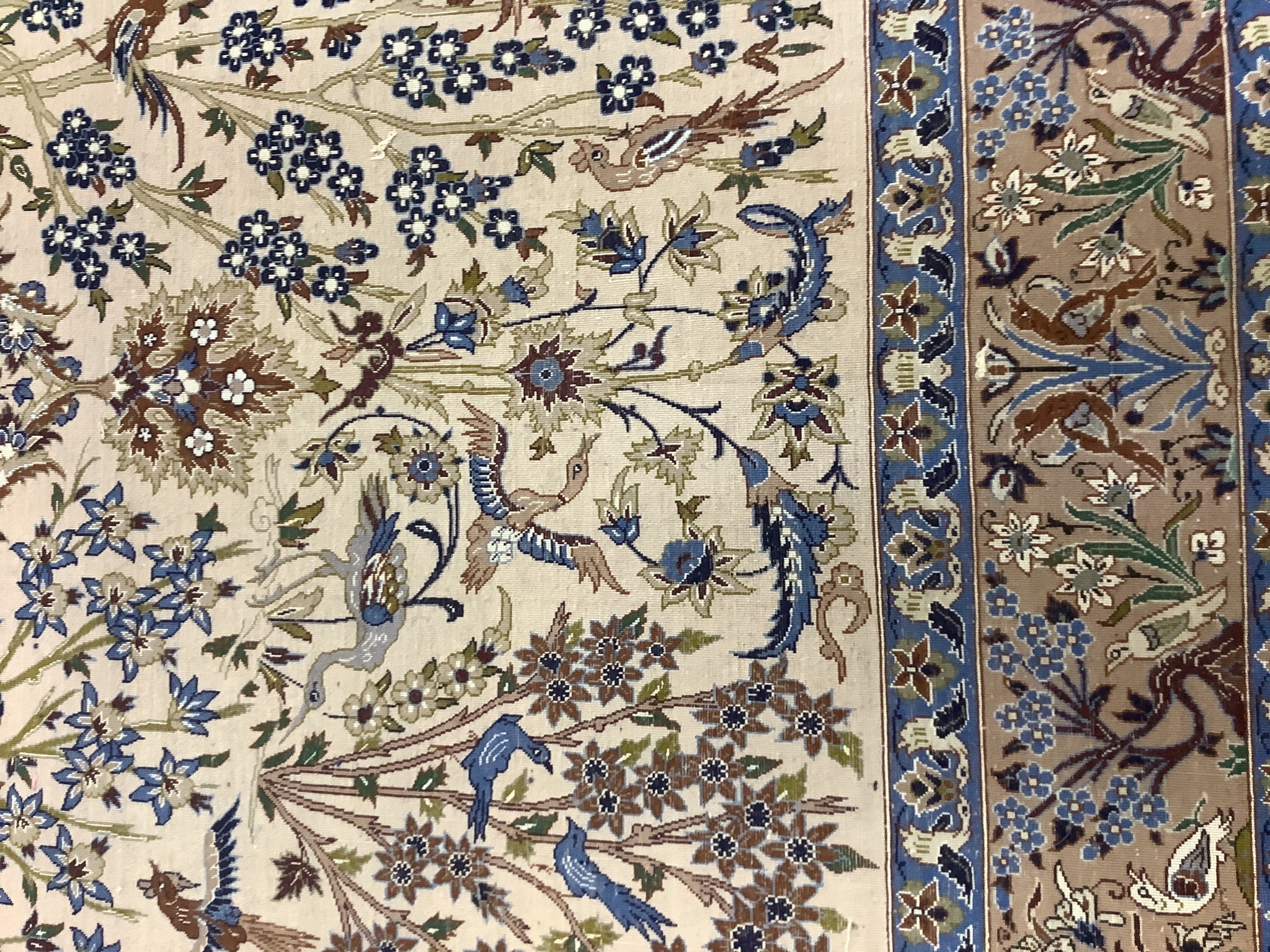 A Tabriz peach ground part silk pictorial rug, 180 x 111cm